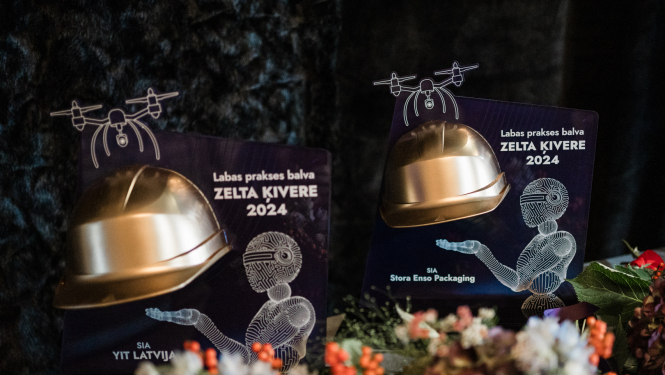 Pietuvināta bilde ar attēlotām labas prakses balvām  "zelta ķivere 2024".